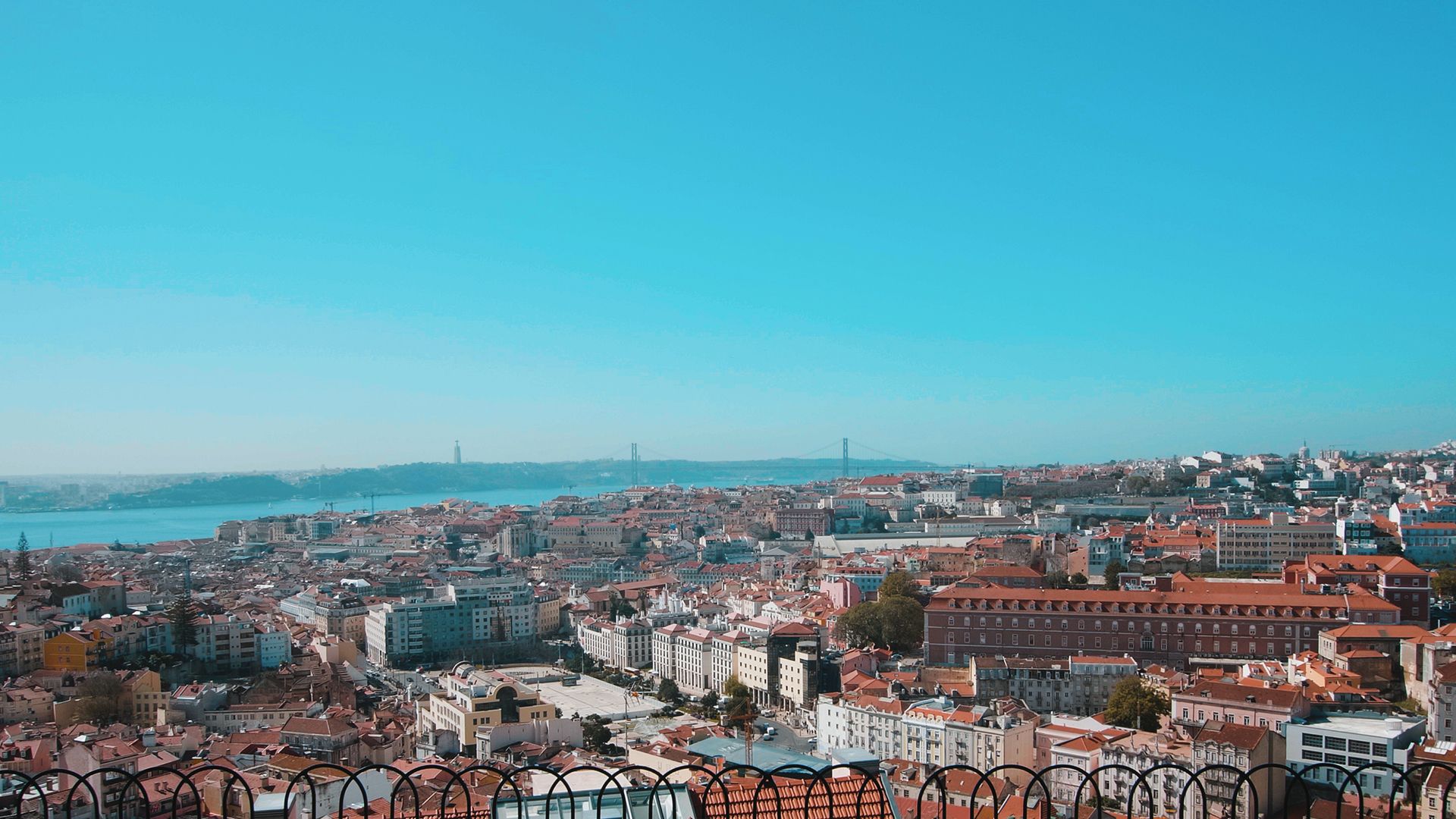 An aerial view of Lisbon with Tagus RIver in the background.
