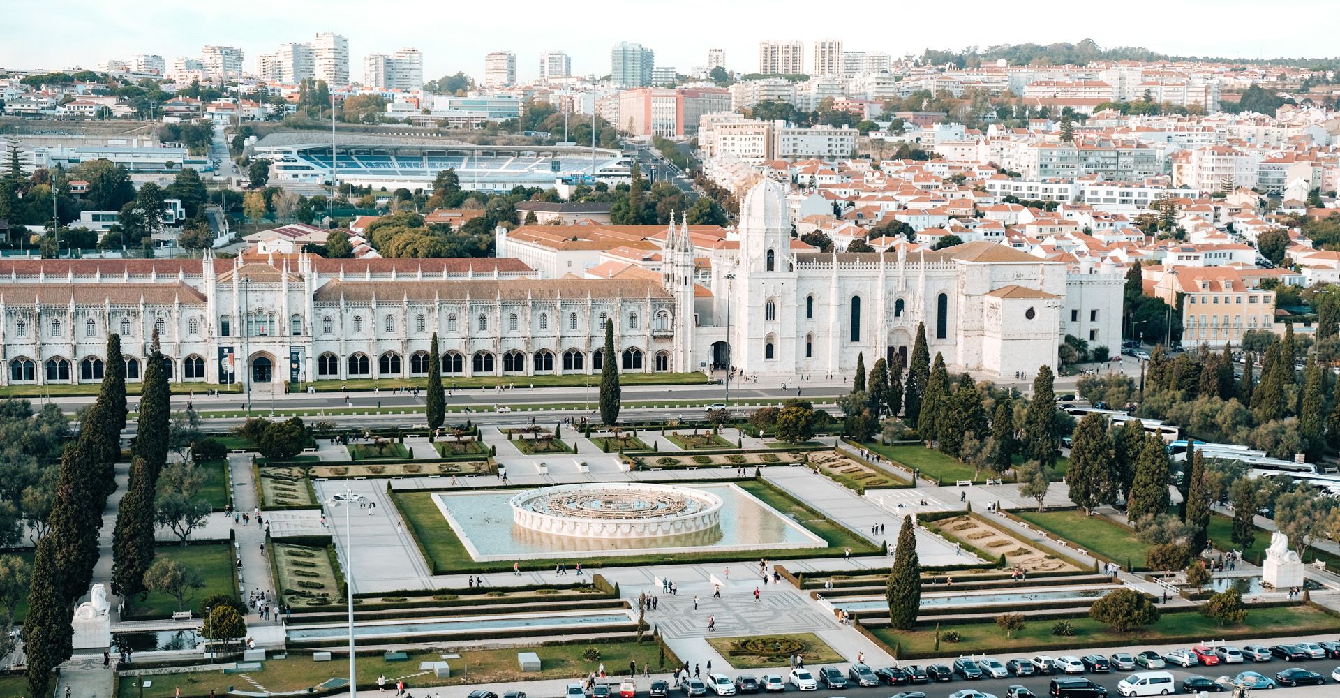 An aerial view of Belém (Lisbon) with a fountain in front the Jerónimos Monastery.